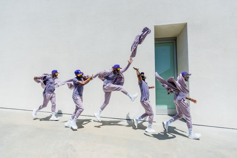 a group of people that are standing in the air